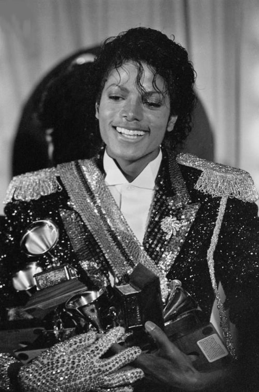 Michael Jackson holds Grammys