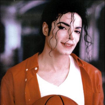 Michael posing with a basket ball