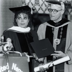 Michael Jackson receives honorary doctorate from Fisk University during United Negro College Fund Awards in 1988.