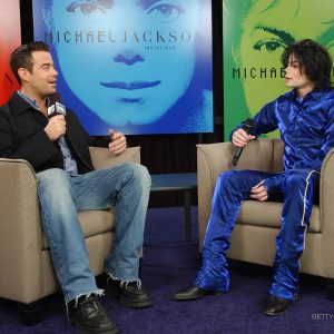 Carson Daly and Michael Jackson during his first-ever in-store record signing for his new album Invincible at the Virgin Megastore, Times Square in New York, NY, on November 7, 2001.
