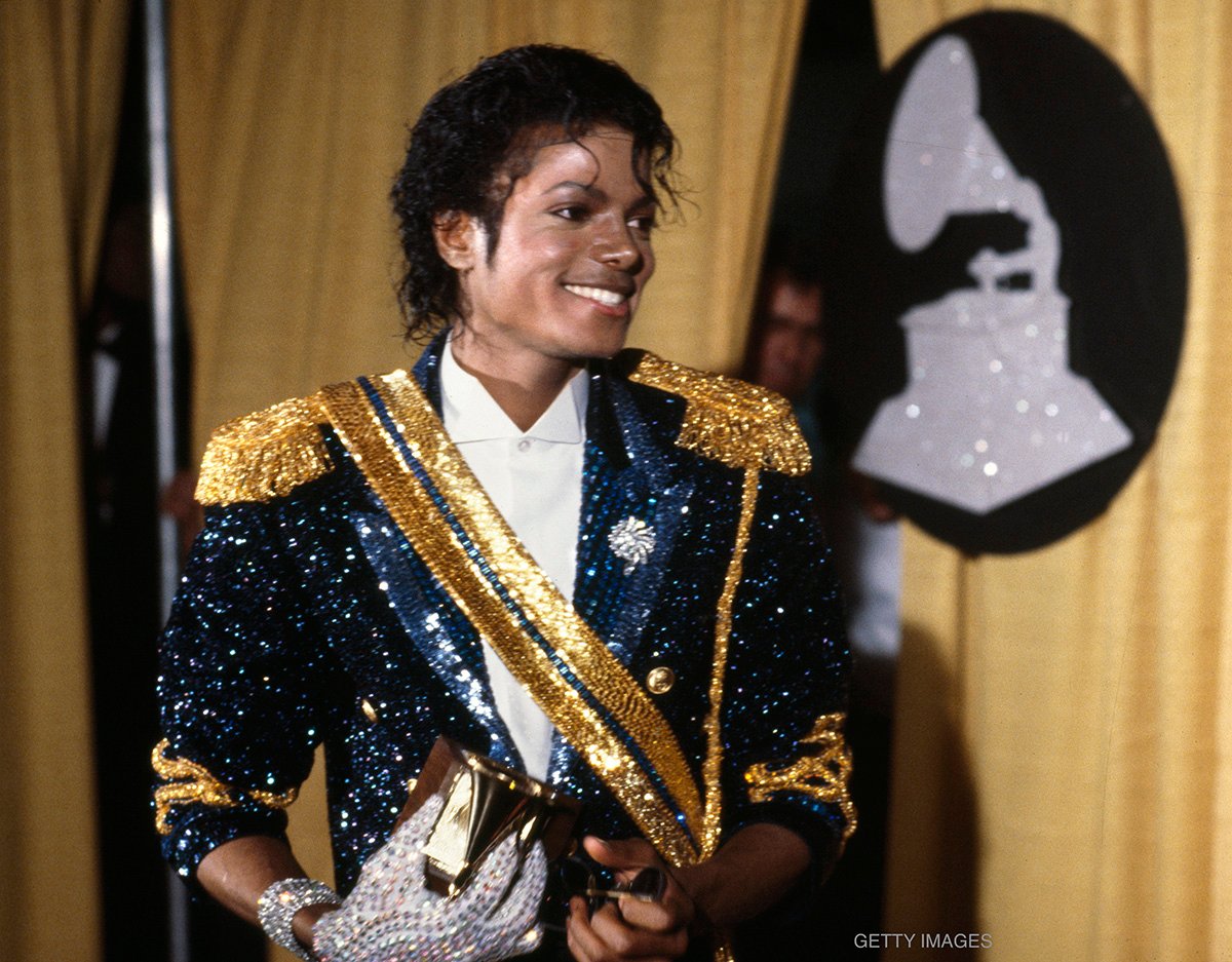 Michael Jackson with awards he won at the 26th Annual GRAMMY Awards, February 28, 1984 at the Shrine Auditorium in Los Angeles, California.
