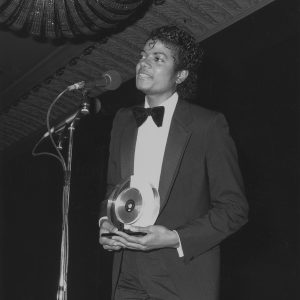 Michael Jackson accepts a record industry award in 1983.