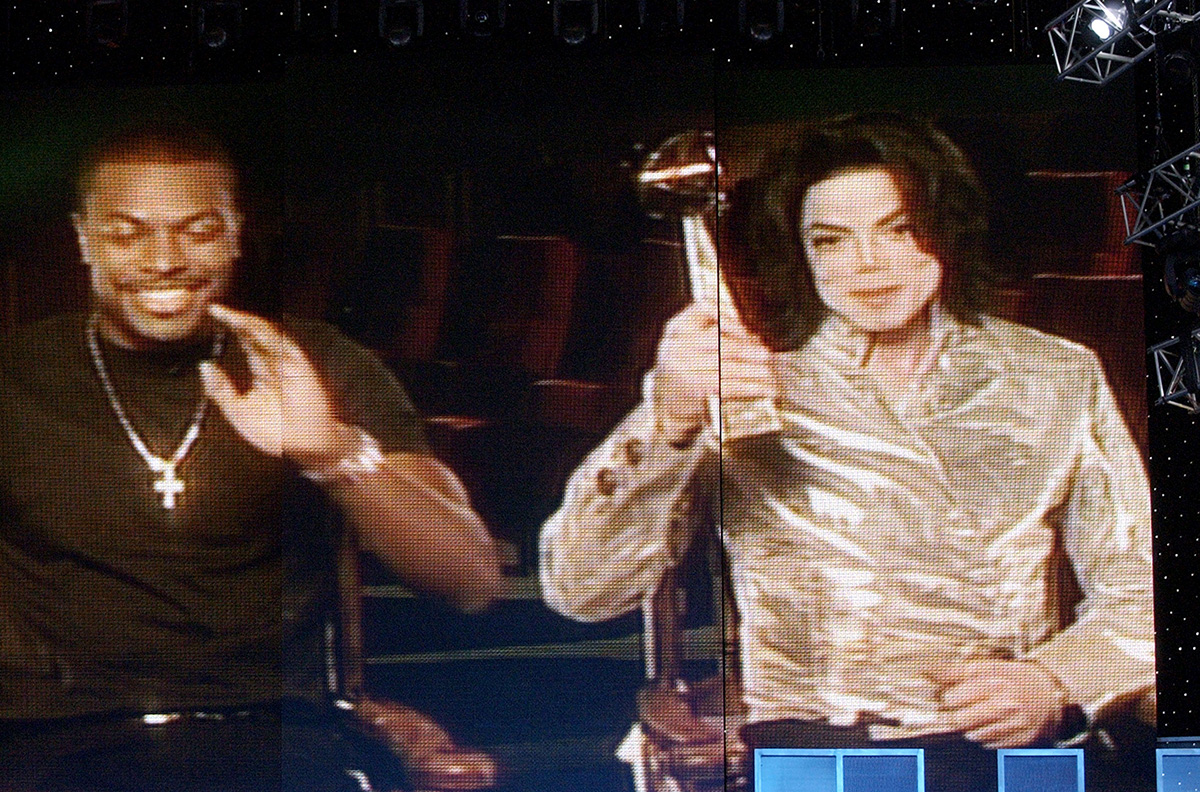 Michael Jackson accepts special Billboard Award presented by Chris Tucker for Thriller album spending 37 weeks at number 1 on Billboard 200