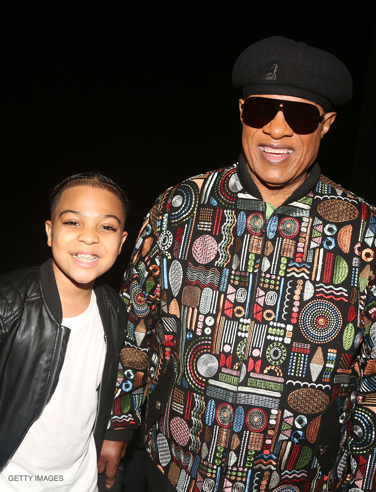 Christian Wilson, one of the two young actors who play "Little Michael" in MJ the Musical, and Stevie Wonder pose backstage at the Neil Simon Theatre in New York, NY, in May 2022.
