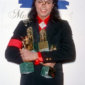 Michael Jackson backstage at the 3rd Annual Soul Train Awards held at the Shrine Auditorium in Los Angeles, CA, on April 13, 1989. Elizabeth Taylor presented Michael with the Heritage Award for Career Achievement and she dubbed him "the true king of pop, rock and soul." It was ultimately shortened to King of Pop and that is how Michael has been known ever since.