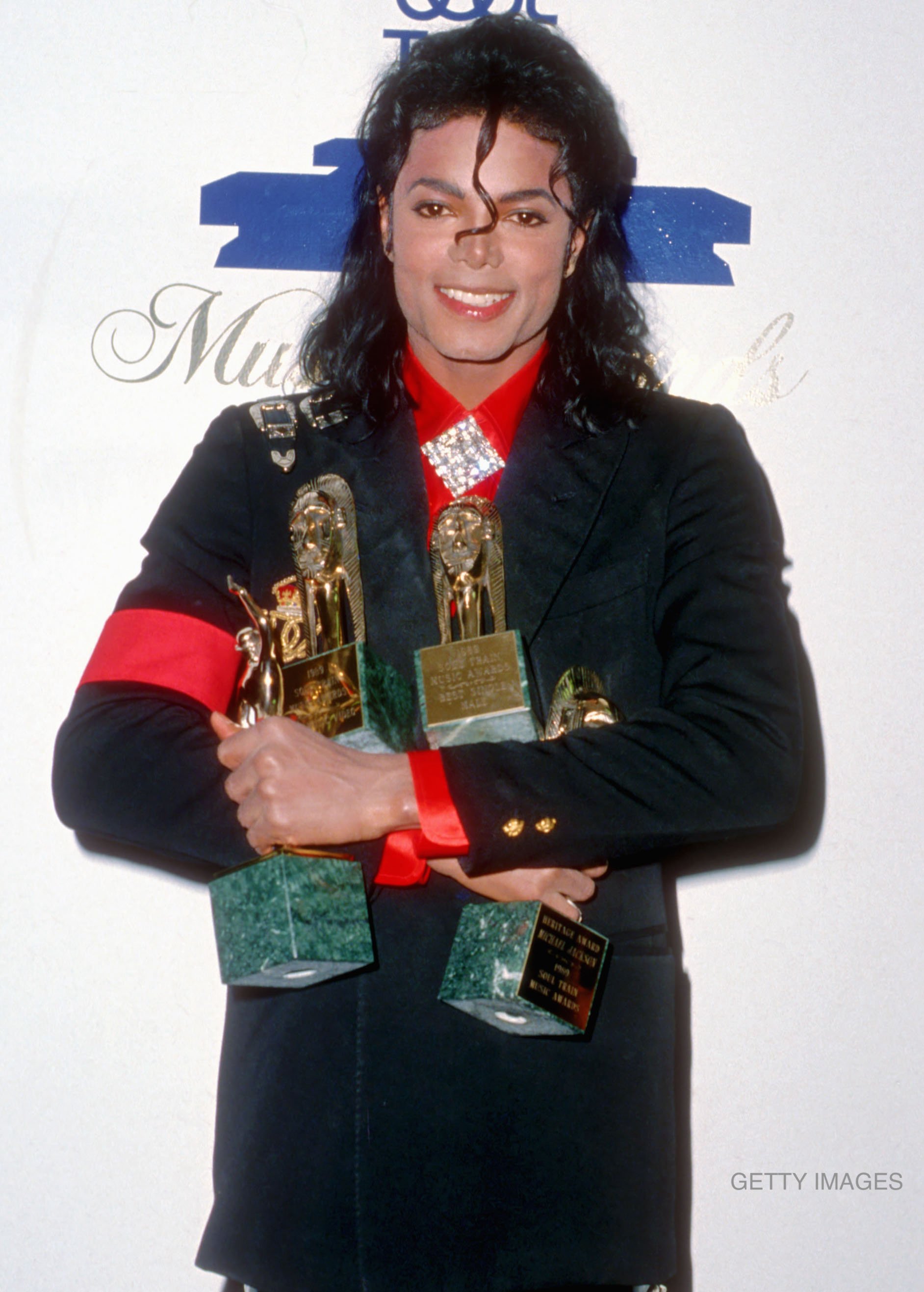 Michael Jackson backstage at the 3rd Annual Soul Train Awards held at the Shrine Auditorium in Los Angeles, CA, on April 13, 1989. Elizabeth Taylor presented Michael with the Heritage Award for Career Achievement and she dubbed him "the true king of pop, rock and soul." It was ultimately shortened to King of Pop and that is how Michael has been known ever since.