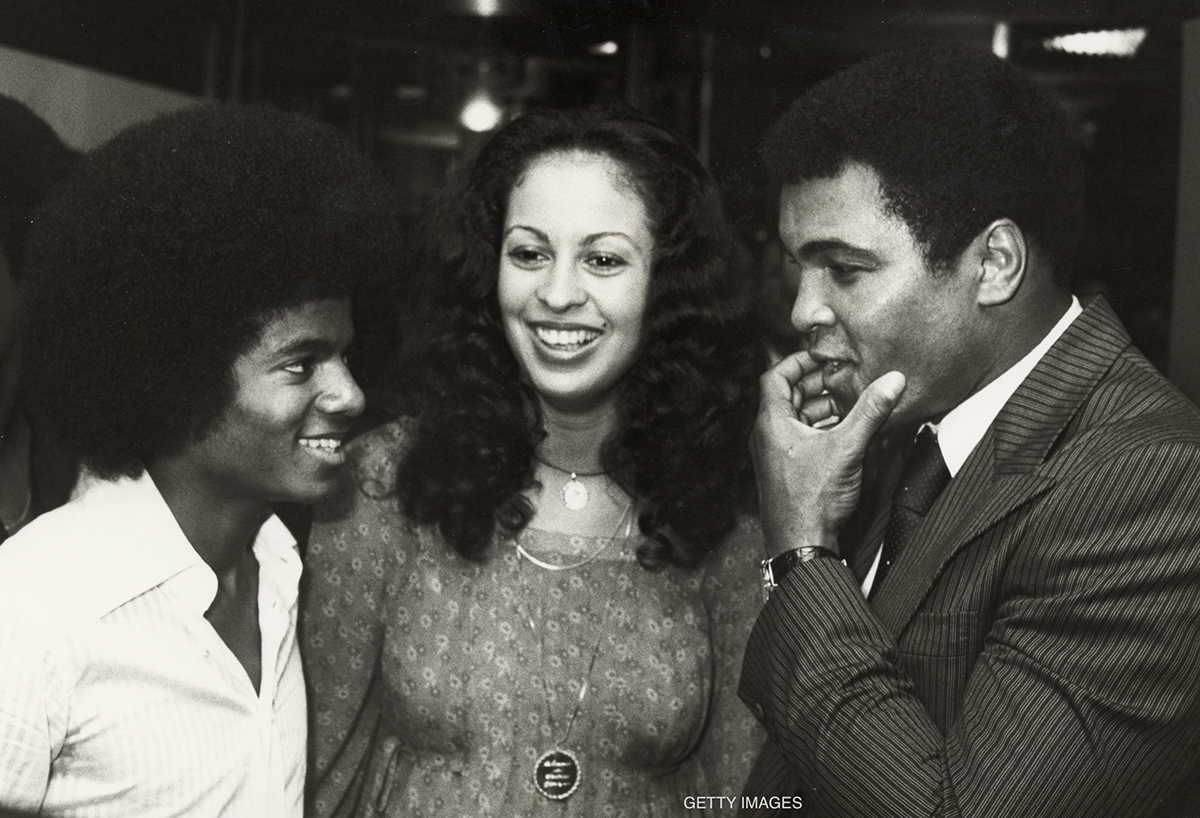 Michael Jackson, Veronica Ali, and Muhammad Ali at tennis tournament in 1977.