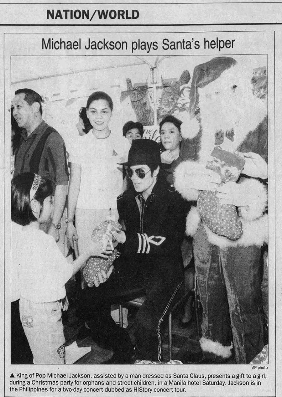 Michael Jackson gives Christmas gifts to orphans in Manila, Philippines in 1996