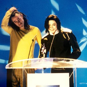 Michael Jackson is presented with Artist Of A Generation Award by Bob Geldof at the BRIT Awards on February 19, 1996.