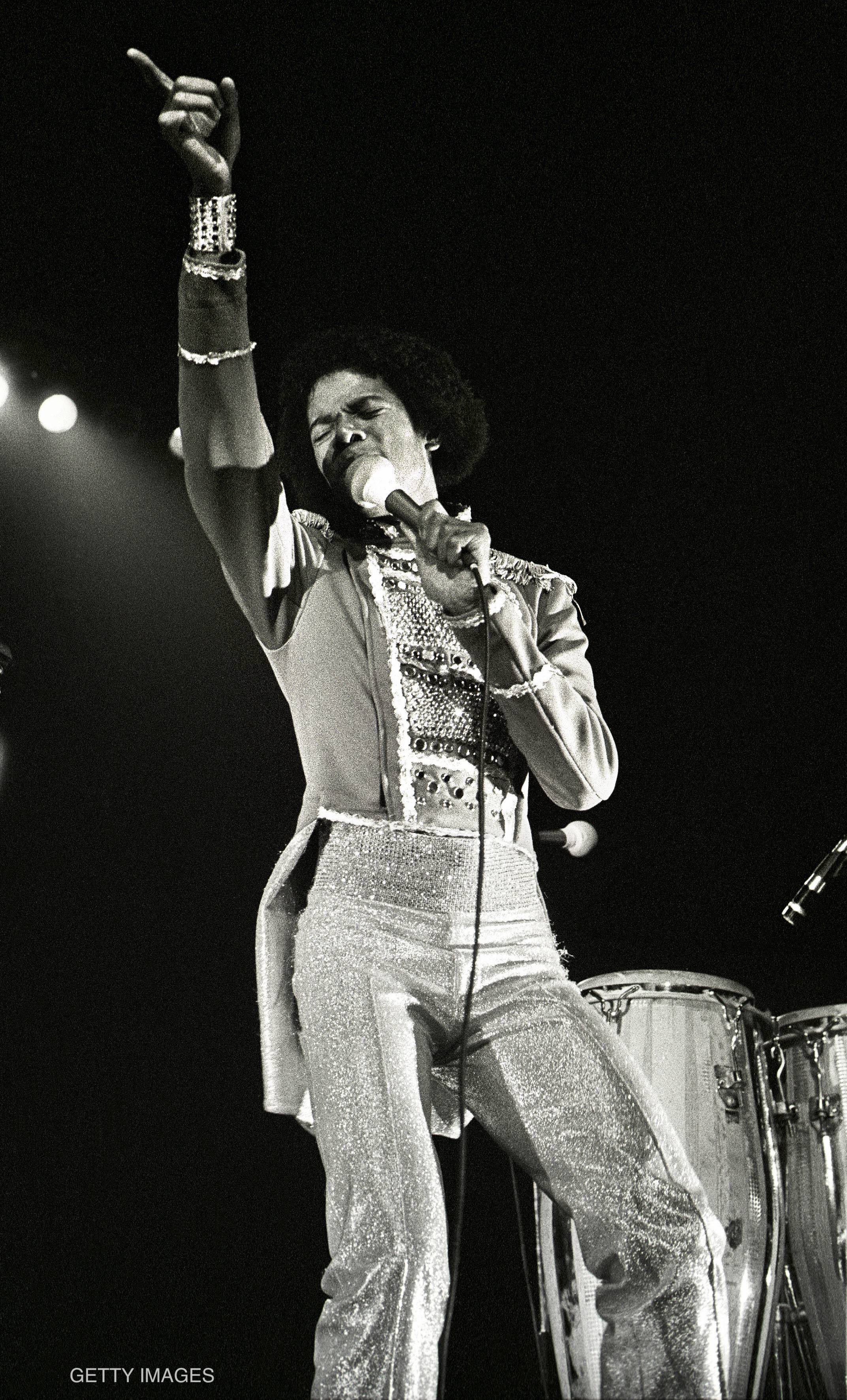 Michael Jackson performs on stage with The Jacksons on the Destiny World Tour in Amsterdam, The Netherlands in February 1979.