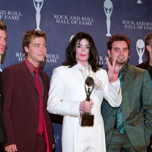 Michael Jackson with NSYNC after accepting his induction into the Rock & Roll Hall of Fame as a solo artist March 19, 2001