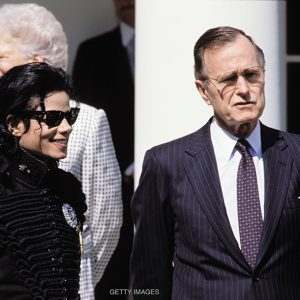 Michael Jackson with President George H.W. Bush and First Lady Barbara Bush at White House for Artist of the Decade award April 5, 1990