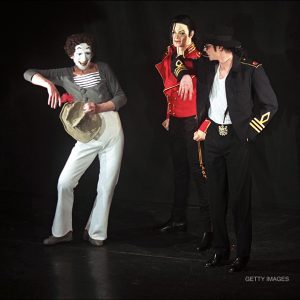 Michael Jackson and Marcel Marceau on stage unveiling MJ wax figure at