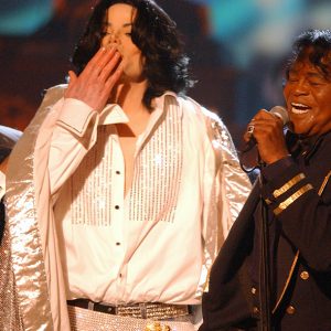 Michael Jackson surprises James Brown on stage to present BET Lifetime Achievement Award on June 24, 2003
